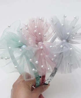 bờm nơ cho bé gái